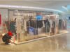 Custom garment display showcase for shopping mall concession kiosk